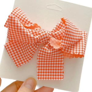 Barrette à cheveux à carreaux orange et blanc pour filles avec bord ondulé décoratif