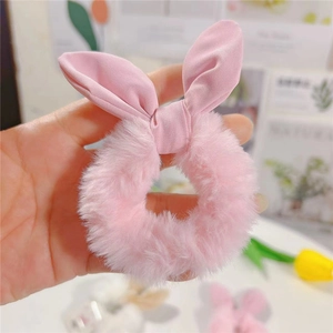 Chouchou lapin rose mignon en peluche avec oreilles en fausse fourrure et nœud doux
