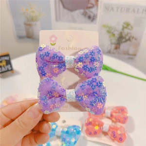 Fermagli per capelli con fiocco in rete viola e paillettes a fiori per bambine
