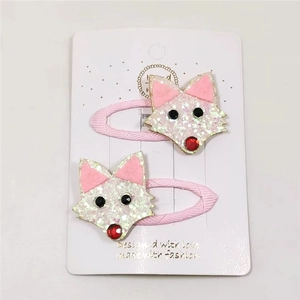 Détail de barrettes renard en paillettes pour enfants avec pinces BB en ruban rose