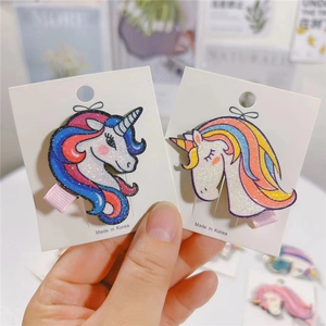Dettagli di fermagli per capelli a forma di unicorno con glitter e nastro rosa per bimbe