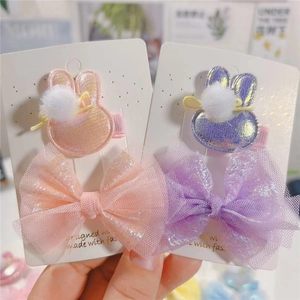 Vue détaillée des barrettes lapin et nœuds laser pour filles en ensembles rose et violet