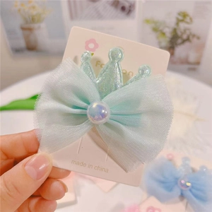 Light green tulle bow hair clip with iridescent crown and pearl for young girls