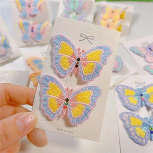 Embroidered butterfly hair clips with colorful rhinestones for girls on display card