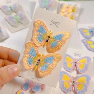 Embroidered butterfly hair clips with colorful crystals for girls, 2-piece set in orange and blue