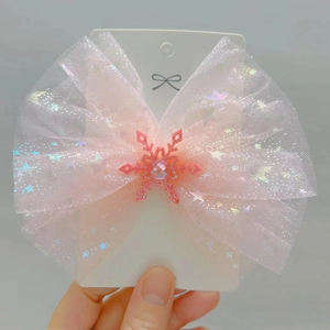 Pink tulle bow hair clip for girls with gold glitter snowflake and pink gemstone