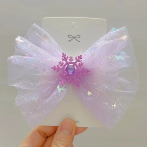 Handmade purple tulle bow hair clip with glittering snowflakes and gemstone for girls