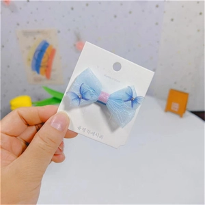 Pince à cheveux nœud en tulle bleu ciel pour filles avec papillon 3D et détails brillants