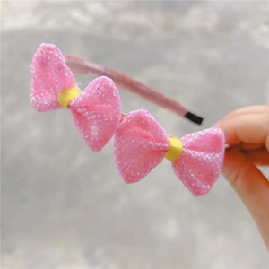 Sweet pink glitter girls headband featuring mesh bows with sparkling silver sequins