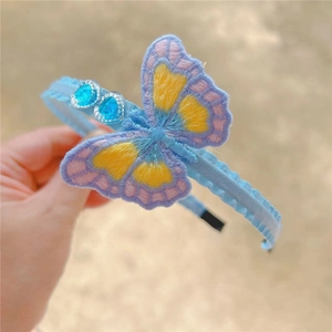 Light blue embroidered butterfly headband with heart-shaped rhinestones and lace trim