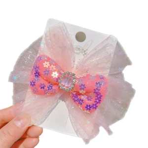 Pink sequin bow hair clip for girls with crystal gemstone and iridescent mesh layers