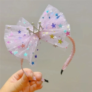 Serre-tête rose pour fille avec grand nœud en tulle étoilé et couronne argentée