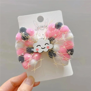 Cute golden mesh hair clip for girls with colorful pom-poms and a smiling cloud charm