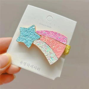 Glittery rainbow shooting star hair clip with pink and blue sequins for children