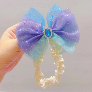 Infant headband with gradient blue-purple mesh bow and blue gemstone accent