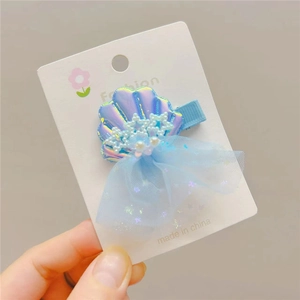 Laser shell hair clip with pearls and mesh star details for beach style