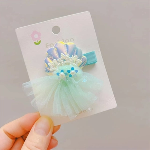 Mermaid seashell hair clip for kids with mint green mesh and pearl decorations