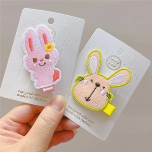 Detailed embroidery of cute bunnies and flowers on children's metal duckbill hair clips