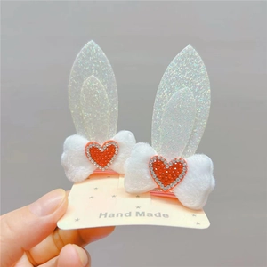 Cute bunny ear hair clips for girls with plush bows and red heart rhinestones