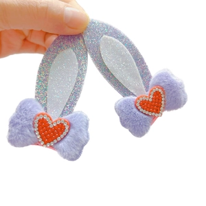 Sparkly purple plush rabbit ear hair clips with red rhinestone hearts for girls