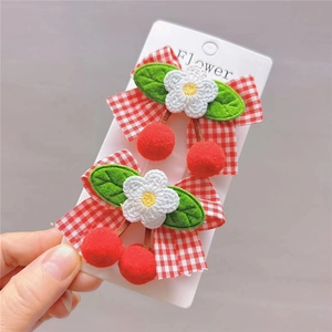 Lolita style red and white plaid bow hair clips with crochet cherry design on card