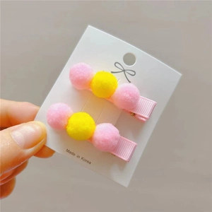Sweet winter cartoon pom-pom hair clips in pink and yellow for girls and kids