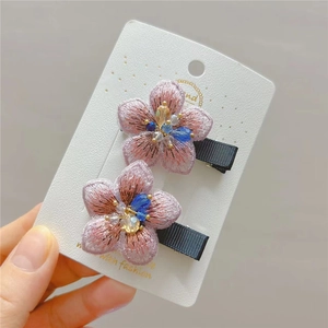 Exquisite embroidered flower hair clips with sparkling crystals and pink silk petals