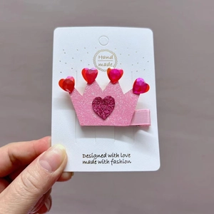 Pink heart crown hair clip for girls with sparkling rhinestones and glitter on display card
