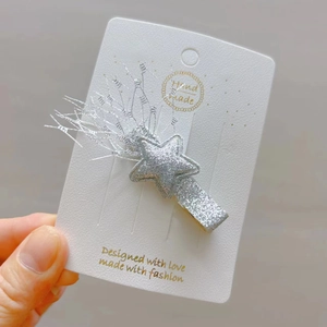 Barrette étoile argentée scintillante avec glands à franges pailletées