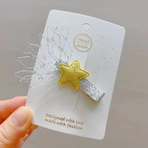 Pince à cheveux étoile faite main pour enfants avec paillettes jaunes et pompons