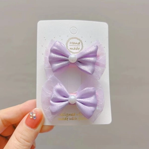 Barrettes à nœuds en satin violet pour filles avec perles blanches et détails en dentelle