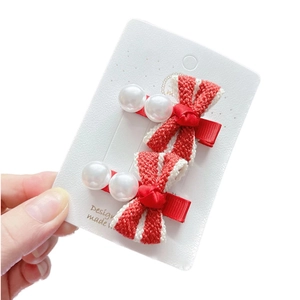 Handcrafted red and white floral bow hair clips with pearls for children, set of two
