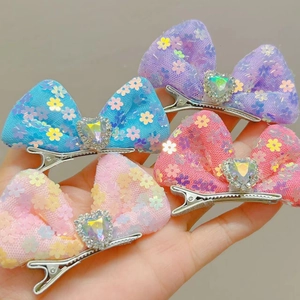 Set of 4 sequin butterfly bow hair clips with heart gems for girls hair styling