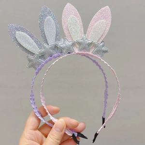 Detail of sequin rabbit ears headbands with silver stars and non-slip wavy band