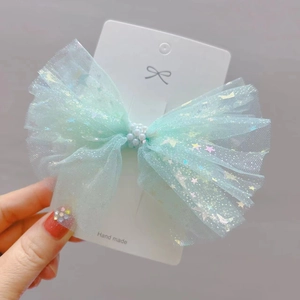 Barrette à nœud en tulle vert menthe pour filles avec paillettes colorées et perle