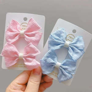 Détail de pinces à cheveux noeuds en tissu fait main pour filles en rose et bleu lot