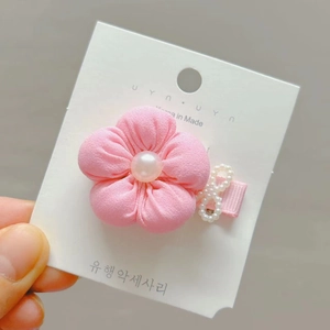 Sweet pink fabric flower hair clip for kids with faux pearls on white display card