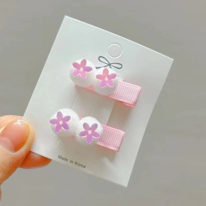 Pink ribbon hair clips with white fluffy pom-poms and sequin flowers for girls