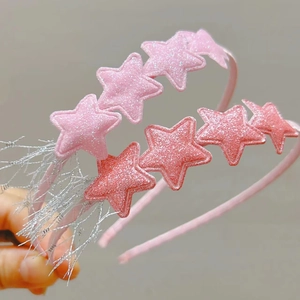 Détail de serre-têtes étoiles roses à paillettes pour enfants avec glands en fil d'argent fin
