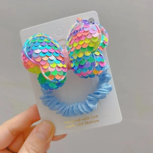 Rainbow sequin bow hair tie with light blue pleated silk scrunchie for girls