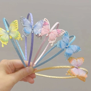 Detail of colorful double-layered butterfly headbands with sequins and shiny rhinestones