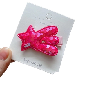 Pink sequin star hair clip for girls with glittering meteor design and fabric duckbill clip