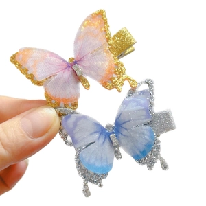 Sparkly double-layered butterfly hair clips for girls with tulle wings and glitter