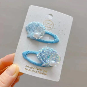 Barrettes à cheveux coquillage bleu océan faites main avec paillettes et perles