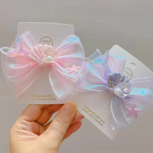 Barrettes à nœud sirène irisées pour filles avec perles et étoile de mer sur carte