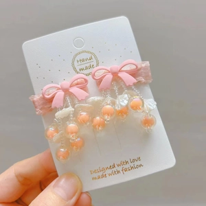 Pink handmade bow hair clips with beaded tassels and shell pendants for Hanfu clothing