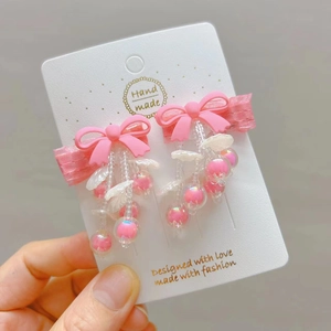 Pink handmade bow hair clips with shell beads and tassels for Hanfu style fashion