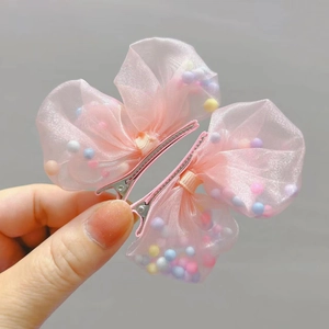 Fermagli per capelli a farfalla in tulle rosa con perline colorate per bambine