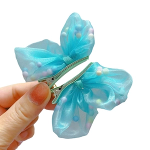 Paio di fermagli per capelli a farfalla in organza blu con perline per bambine