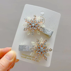 Paire de barrettes flocon de neige scintillantes pour filles avec strass centraux